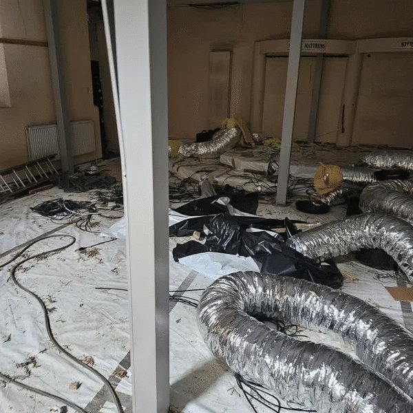 Disused commercial air conditioning ductwork installation in an empty building.